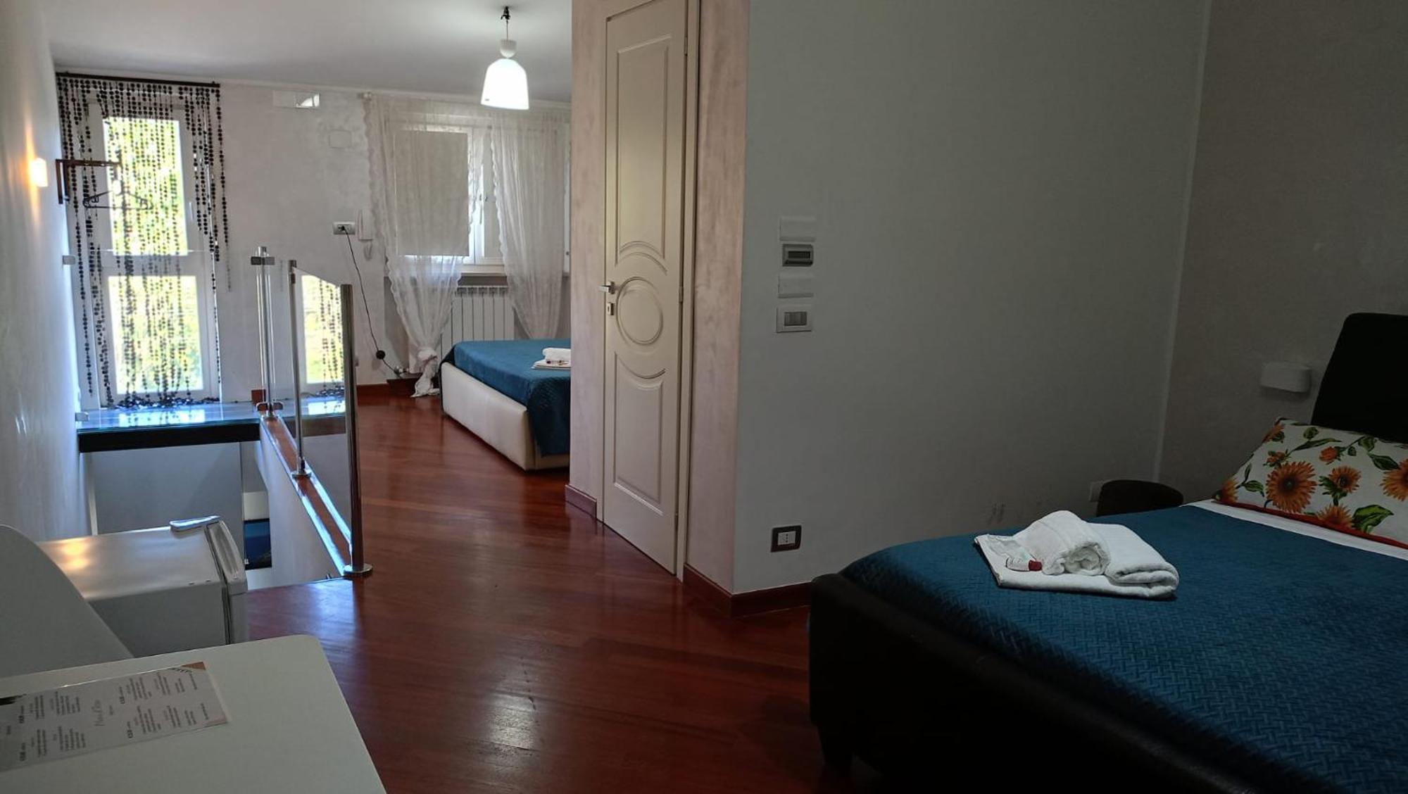 Costa Costa Rooms Sant'Egidio del Monte Albino Rum bild